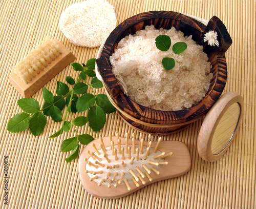 washtub with bath salt, comb, mirror and brush