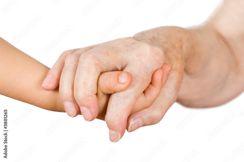 Hands of the girl and the grandmother on an isolated background Hands of the girl and the grandmother on an isolated background