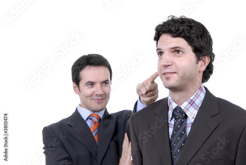 two young business men portrait on white. focus on the right man