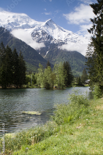 View of Mont Blanc mountain range reflected in lake