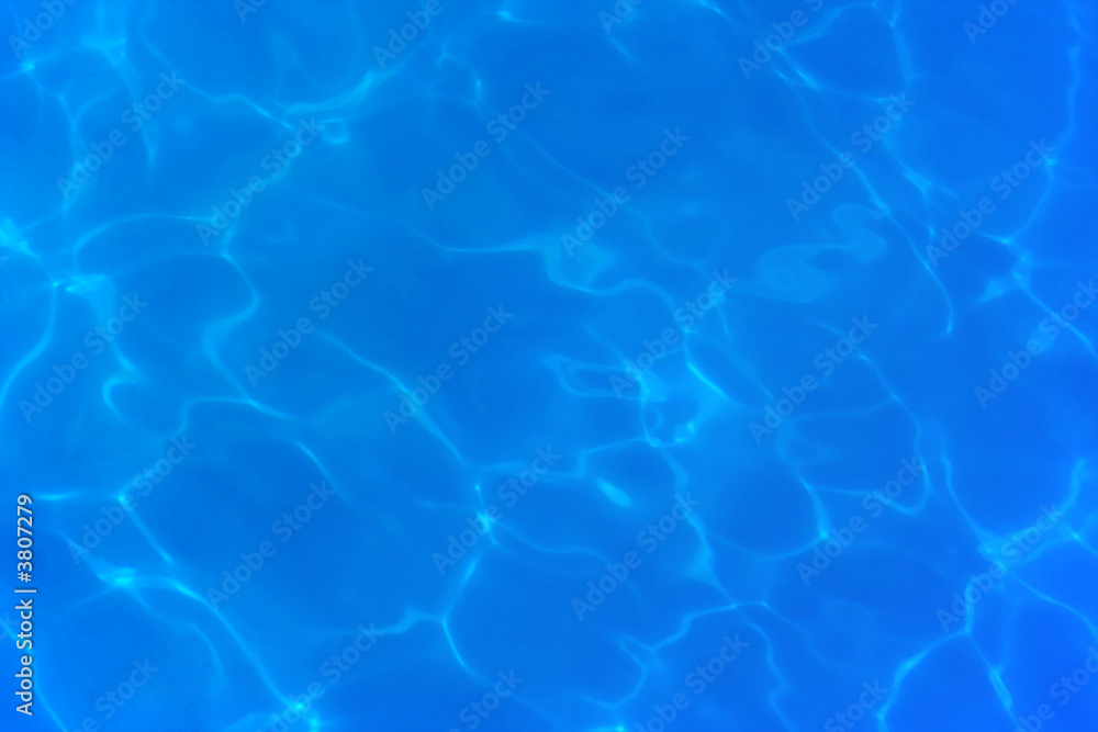 Abstract light lines on the floor of the swimming pool