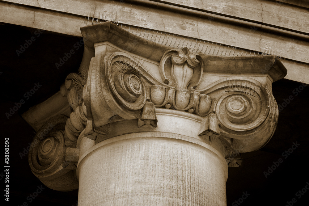 Close up of top of an ionic style column  - obrazy, fototapety, plakaty 