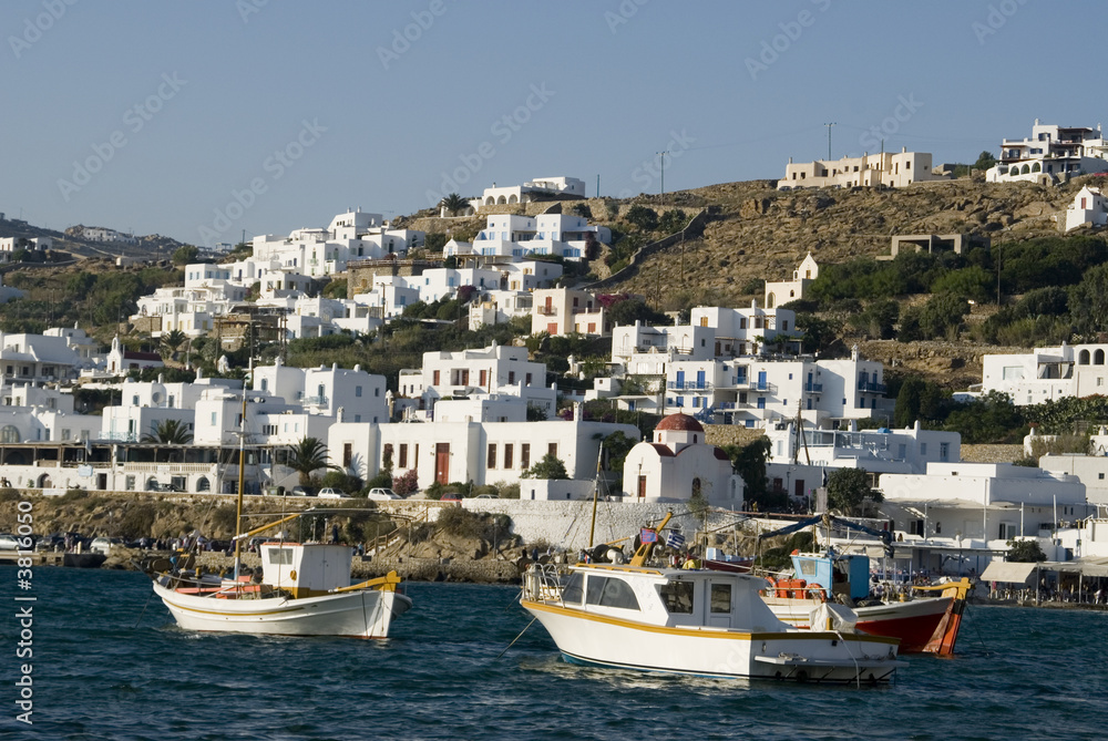 greek island harbor with fishing boats classic  arcthitecture