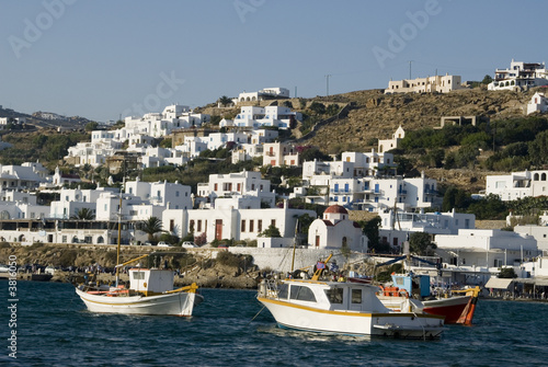 greek island harbor with fishing boats classic arcthitecture
