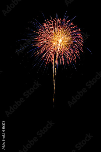 Holiday display of fireworks in the night sky