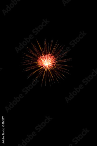 Holiday display of fireworks in the night sky