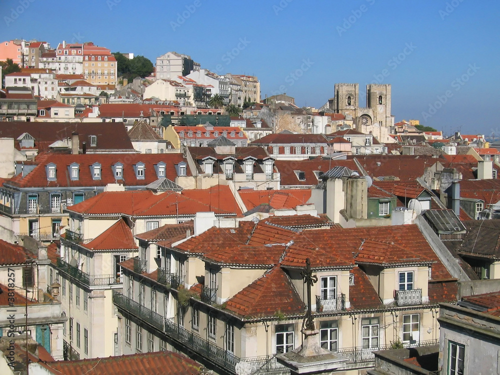 Mediterrean city (Lisbon) view with old houses and a church