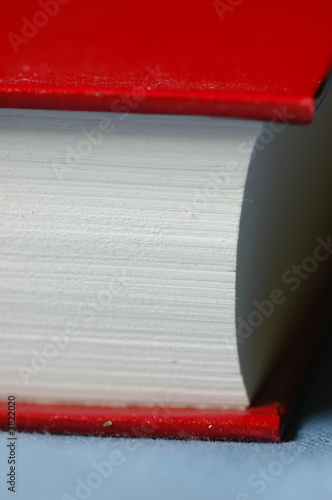 A detailed view of a red hardcover book