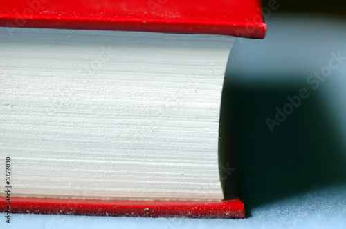 A detailed view of a red hardcover book