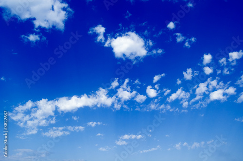 White clouds in the blue sky. Cloudscape