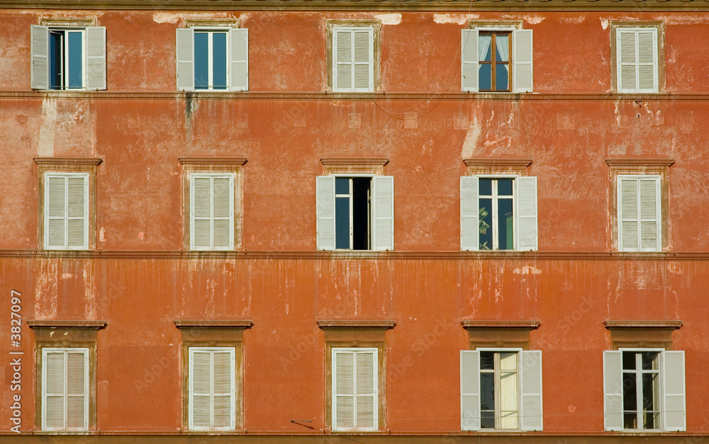 windows of old house, rome, italy