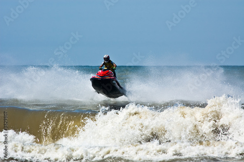 extreme  jet-ski watersports with big waves photo