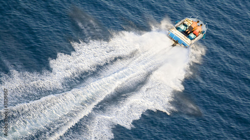 speeding motor boat