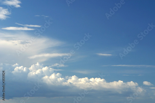 Fototapeta Naklejka Na Ścianę i Meble -  Blue sky and fluffy white clouds background.