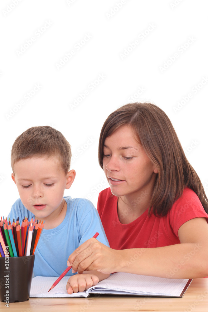 mother and 5 years old son drawing together isolated mother and 5 years old son drawing together isolated