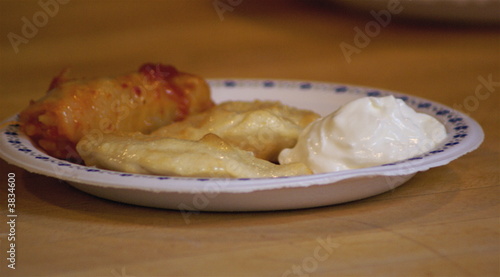 cabbage rolls,perogies, and sour cream