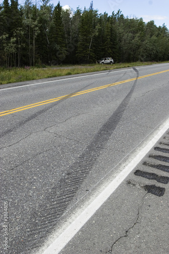 Tire marks and car rolled over 