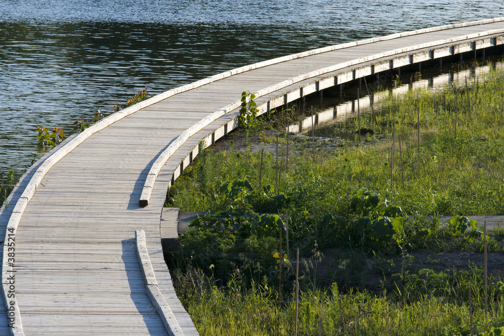 Fototapeta premium New boardwalk in a city park