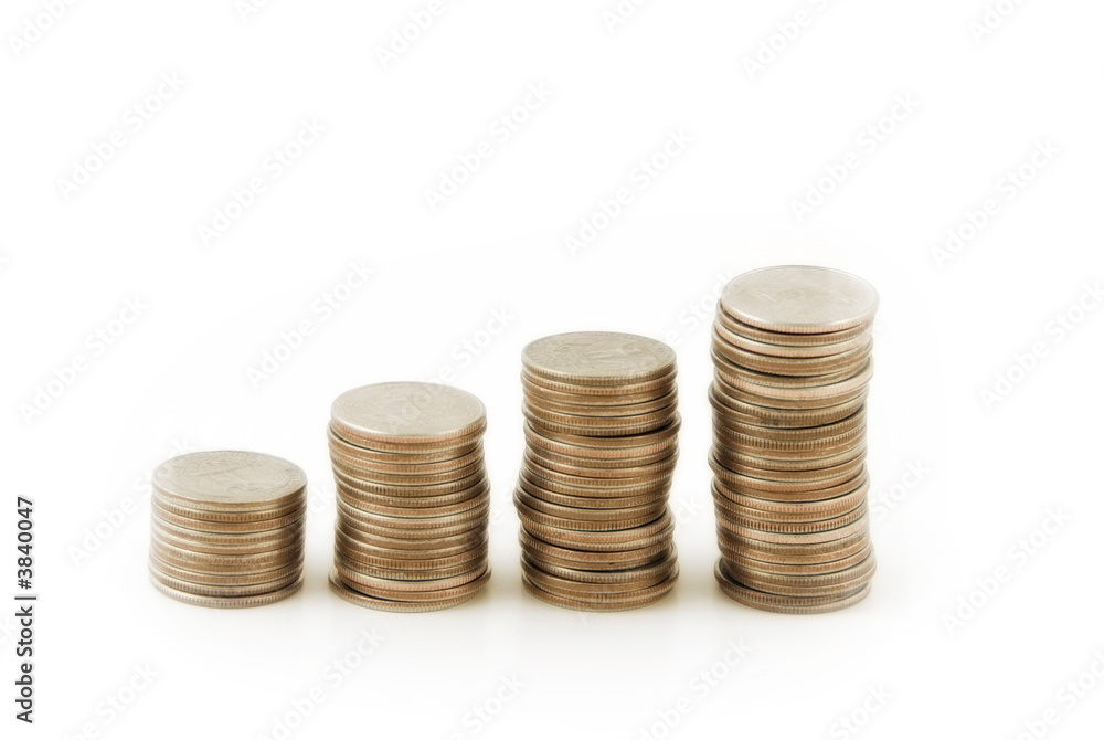 Stacks of coins (US quarters) quarters on white background Stacks of coins (US quarters) quarters on white background