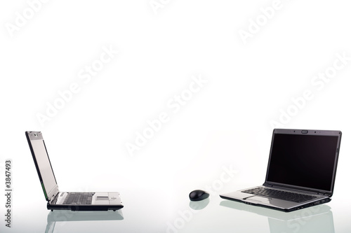 Modern laptop computers and wireless mouse