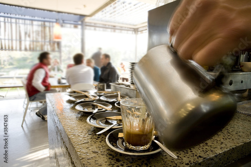 Making latte's and coffee at a cafe 