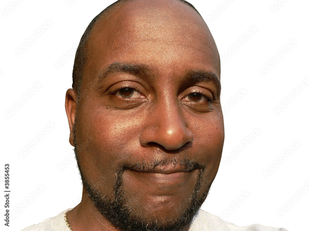 Obraz premium close up of a african american male's face while he is smiling