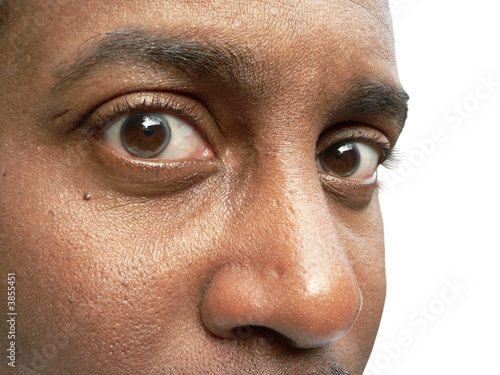 three quarter view close up of a african american male's eyes