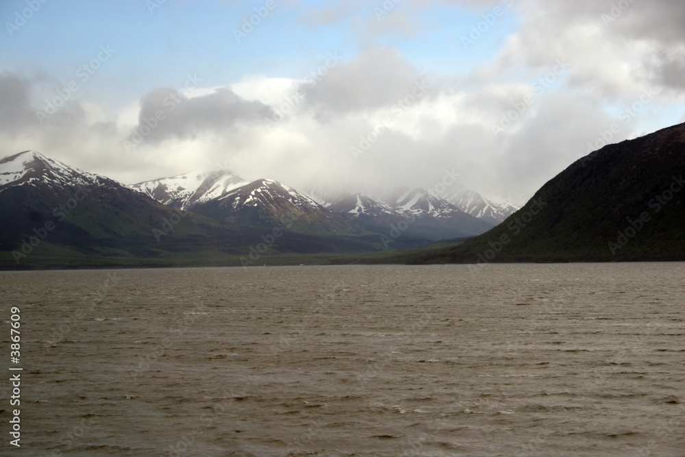 Mountains and clouds with ocean Mountains and clouds with ocean