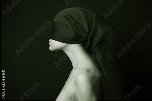 Naked (nude) woman with  black bandage.  Artistic photo.