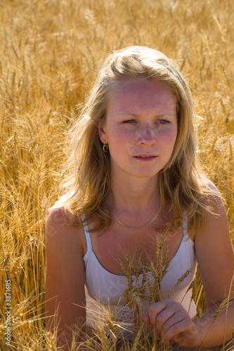 Pretty womans portrait in wheat field 2