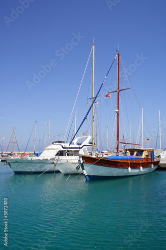 group of yachts moored at sunny bay.