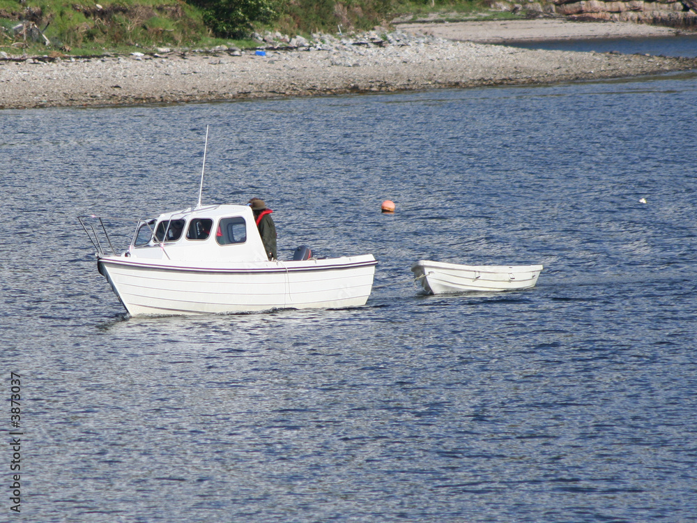 boat pulling dingy boat pulling dingy