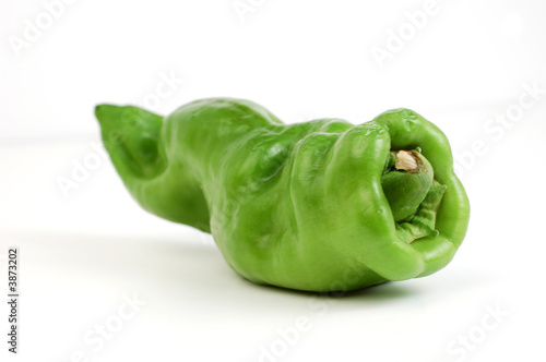 A fresh pepper on a white background.