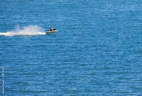Jetski flying above the water
