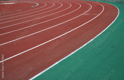 Racetrack in stadium with an artificial covering