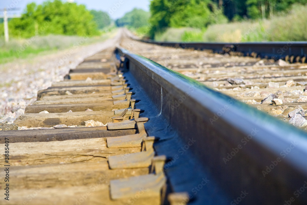 Train tracks fading towards the horizon