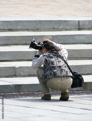 The photographer with the camera.