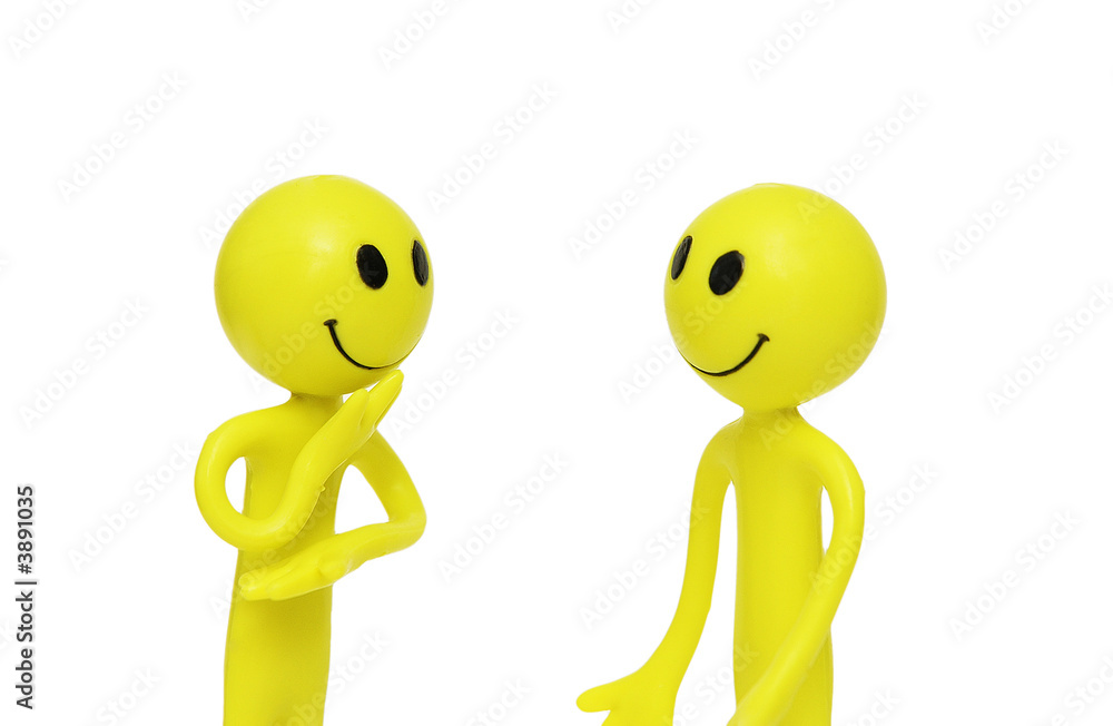 Two smilies engaged in the business discussion Two smilies engaged in the business discussion
