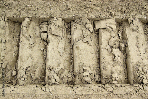 The track of the caterpillar on the sand