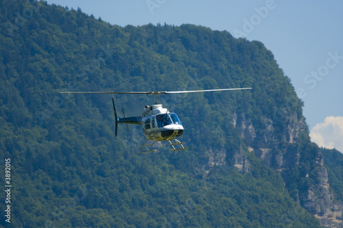 Fototapeta Naklejka Na Ścianę i Meble -  Helicopter in acrobations during airshow