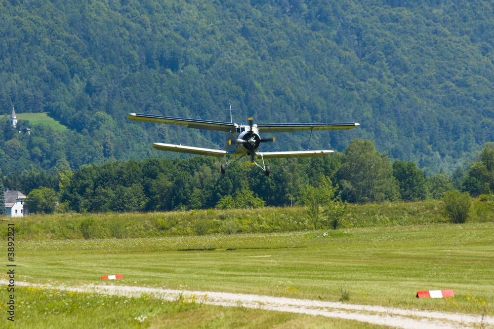 Fototapeta premium Biplane An-2 (Antonov) in the airshow