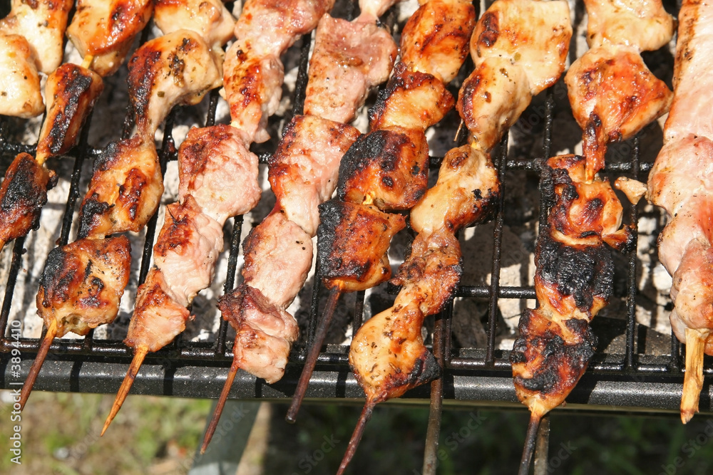 barbecue with delicious grilled meat on grill