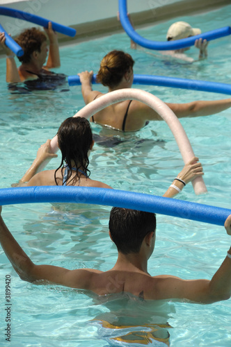 People doing water aerobic in pool