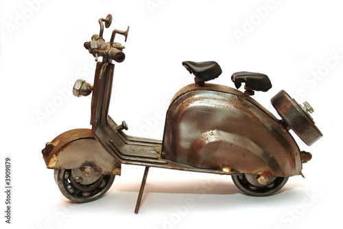 old retro grunge toy motorbike on white background