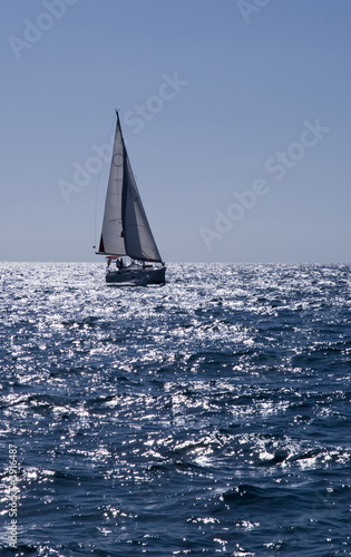 Yacht sailing in blue see © Aradan