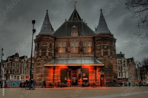 old dutch building in red lights in amsterdam