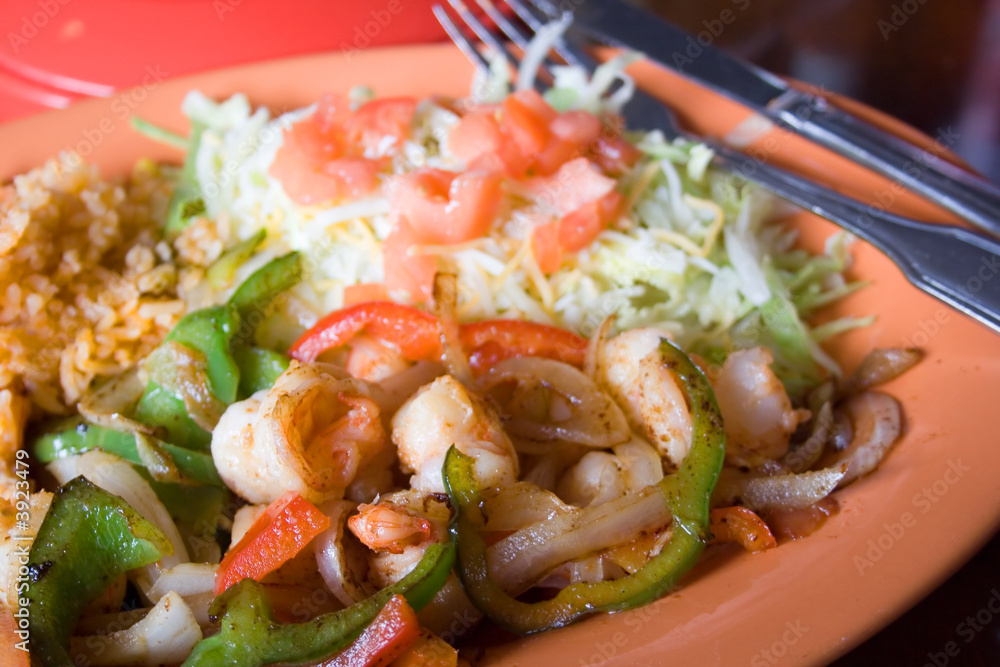 Shrimp Fajita Dinner with Rice and Salad at a Mexican Restaurant