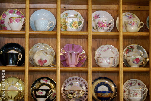 Shelves of fine china cups and saucers