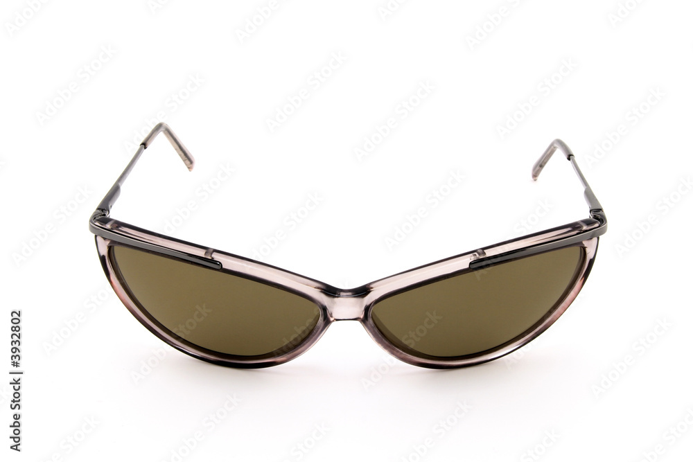 Brown stylish sunglasses isolated on white background. Brown stylish sunglasses isolated on white background.