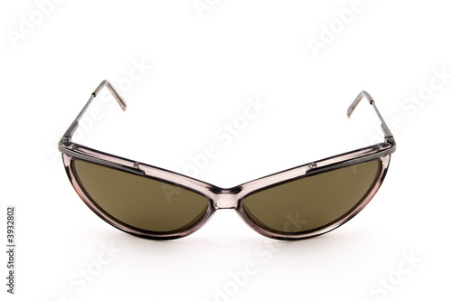 Brown stylish sunglasses isolated on white background.